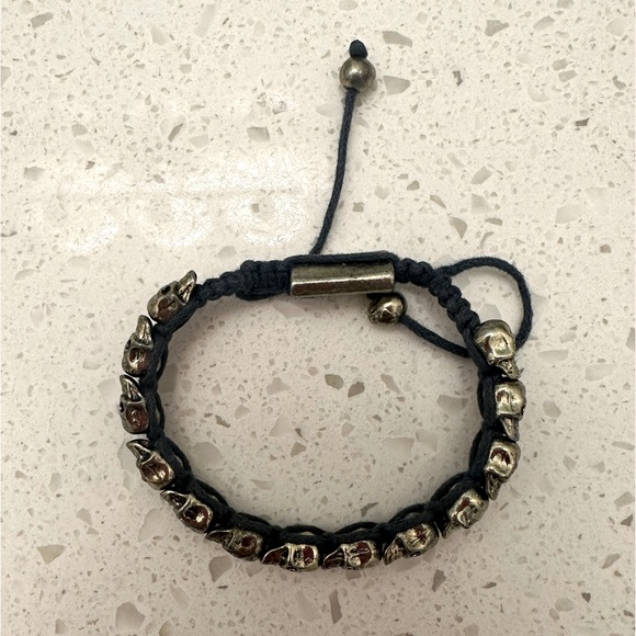 BRASS SKULL BRACELET on blue string - Picture 2 of 2